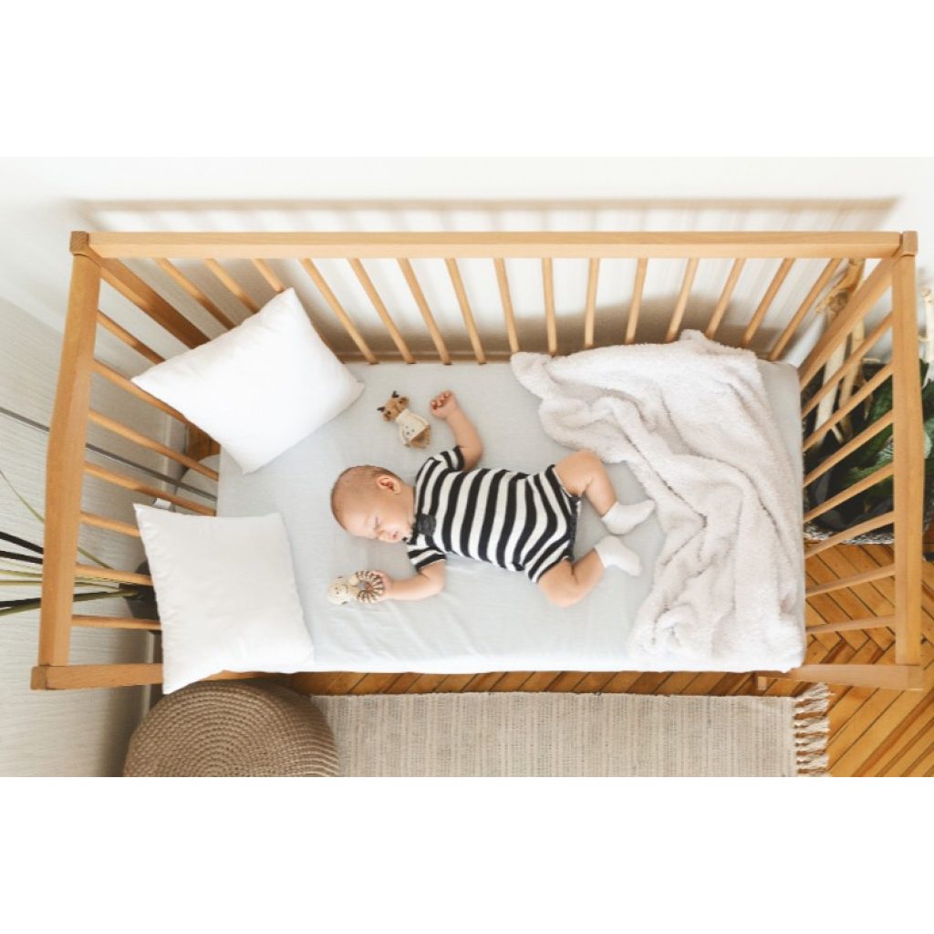 baby sleeping in rented crib in Point Pleasant, New Jersey [adobe express]